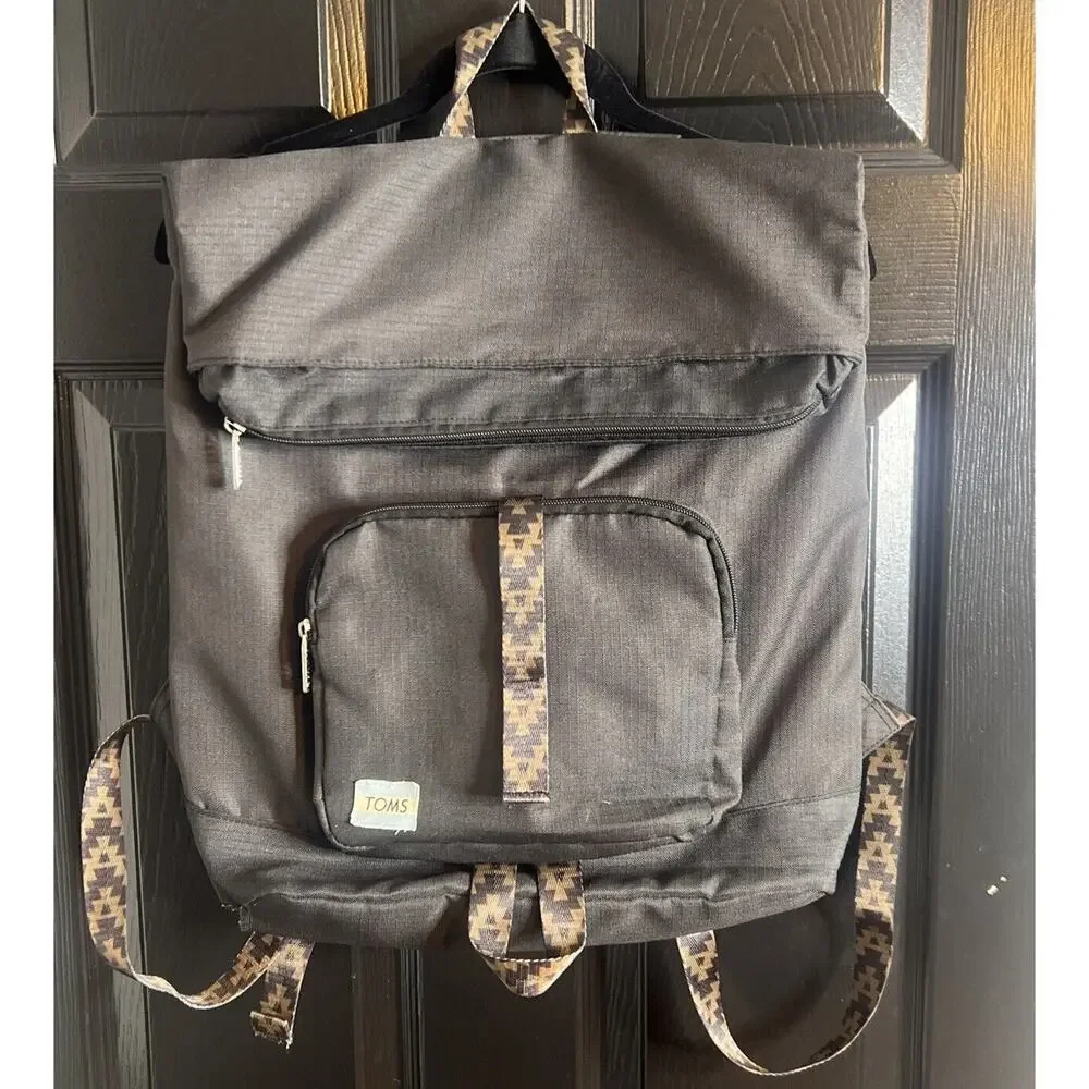 Toms StandUp Backpack Solid Black W/ Aztec detail Zipper Closure Fold-over Flaws